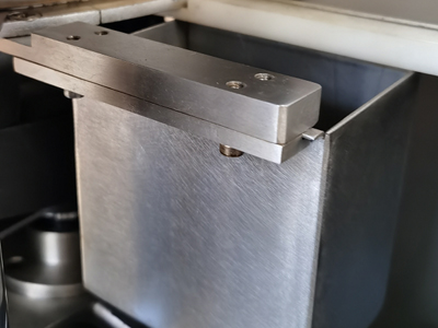 First-Layer Tablet outlet tank